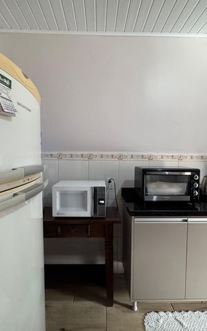 Casa à venda com 75m², 3 quartos e 3 vagas Casa à venda com 75m², 3 quartos e 3 vagasCozinha