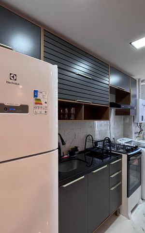 Apartamento para alugar com 46m², 2 quartos e 1 vaga Apartamento para alugar com 46m², 2 quartos e 1 vagaCozinha e Área de Serviço