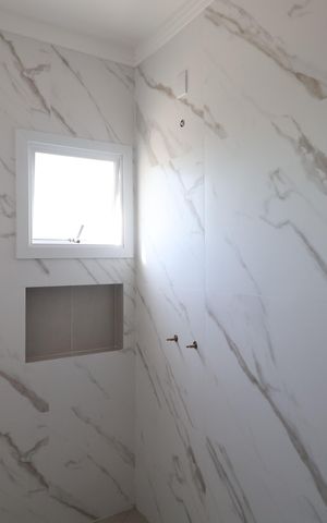 Casa à venda com 132m², 3 quartos e 3 vagasBanheiro da Suíte