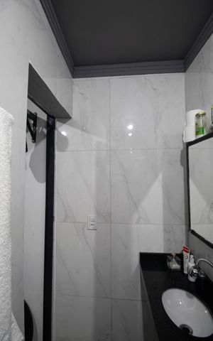 Casa à venda com 132m², 4 quartos e 2 vagas Casa à venda com 132m², 4 quartos e 2 vagasBanheiro da Suíte 1