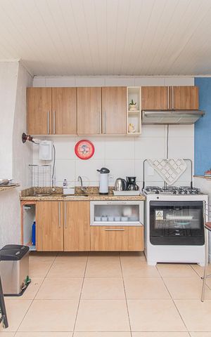Casa à venda com 198m², 2 quartos e 4 vagasCozinha e Área de Serviço