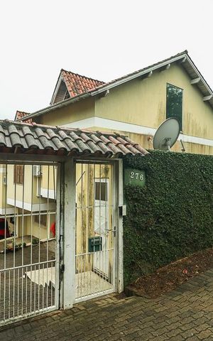 Casa de condomínio à venda com 179m², 3 quartos e 2 vagasFachada