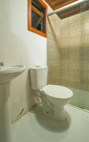 Casa de condomínio à venda com 179m², 3 quartos e 2 vagasBanheiro Suite 2