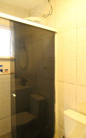 Casa de condomínio à venda com 62m², 1 quarto e sem vagaBanheiro