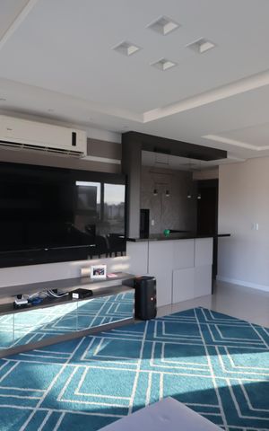 Apartamento à venda com 131m², 2 quartos e 3 vagasSala de TV