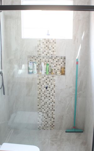 Casa à venda com 240m², 4 quartos e 2 vagasBanheiro da Suíte 1