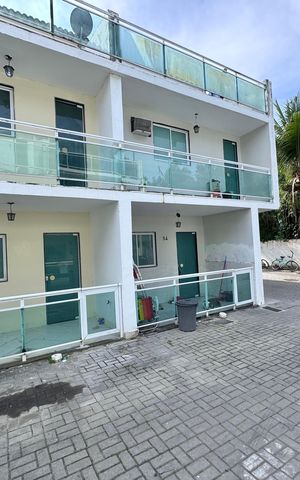 Casa de condomínio à venda com 132m², 3 quartos e 1 vaga Casa de condomínio à venda com 132m², 3 quartos e 1 vagaFachada
