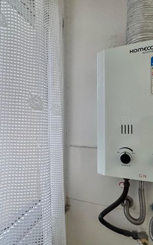 Apartamento à venda com 52m², 3 quartos e 1 vaga Apartamento à venda com 52m², 3 quartos e 1 vagaCozinha e Área de Serviço