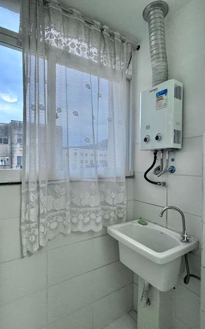 Apartamento à venda com 52m², 3 quartos e 1 vaga Apartamento à venda com 52m², 3 quartos e 1 vagaCozinha e Área de Serviço