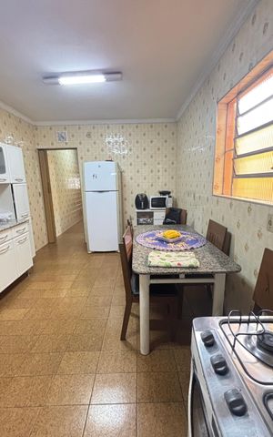 Casa à venda com 157m², 3 quartos e 2 vagas Casa à venda com 157m², 3 quartos e 2 vagasCozinha