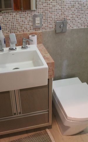 Casa à venda com 135m², 2 quartos e 2 vagasBanheiro da Suíte 1