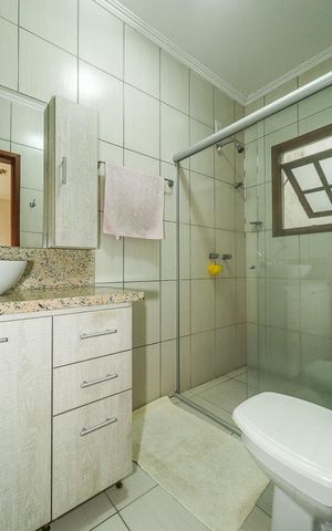 Casa de condomínio à venda com 191m², 3 quartos e 2 vagasBanheiro