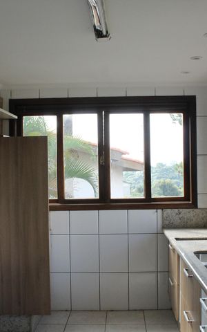 Casa de condomínio para alugar com 350m², 3 quartos e 2 vagasCozinha