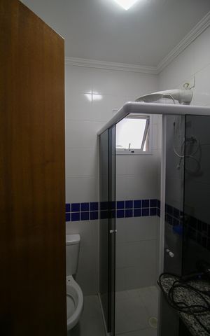 Casa de condomínio à venda com 55m², 2 quartos e 1 vaga Casa de condomínio à venda com 55m², 2 quartos e 1 vagaBanheiro da Suíte 1