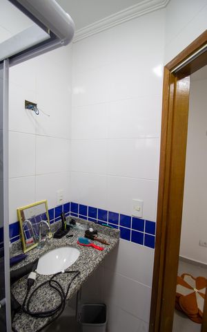 Casa de condomínio à venda com 55m², 2 quartos e 1 vaga Casa de condomínio à venda com 55m², 2 quartos e 1 vagaBanheiro da Suíte 1