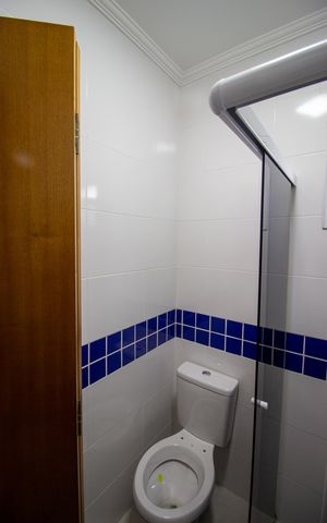 Casa de condomínio à venda com 55m², 2 quartos e 1 vaga Casa de condomínio à venda com 55m², 2 quartos e 1 vagaBanheiro da Suíte 1