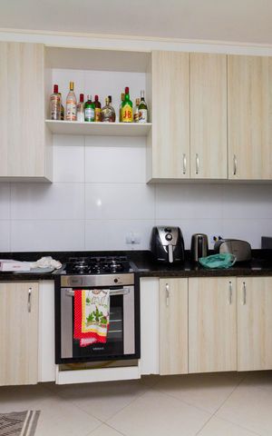 Casa de condomínio à venda com 132m², 3 quartos e 2 vagas Casa de condomínio à venda com 132m², 3 quartos e 2 vagasCozinha