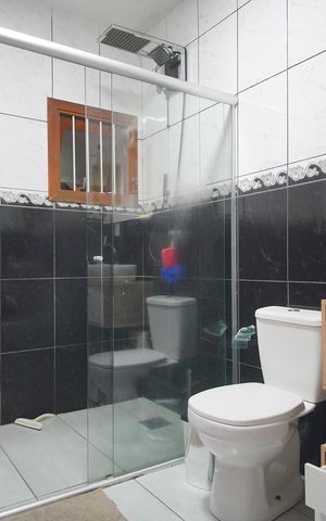 Casa à venda com 149m², 3 quartos e 3 vagasBanheiro da Suíte