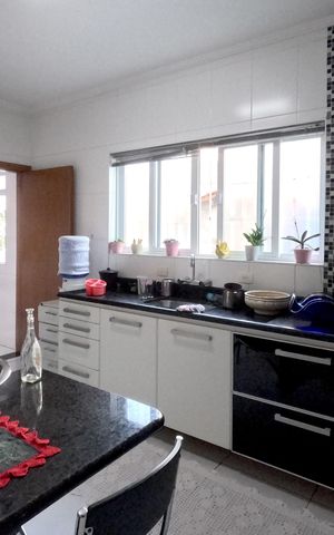 Casa para alugar com 290m², 4 quartos e 3 vagasCozinha - 1º Piso