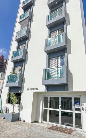 Apartamento à venda com 115m², 2 quartos e 2 vagasFachada + plaquinha