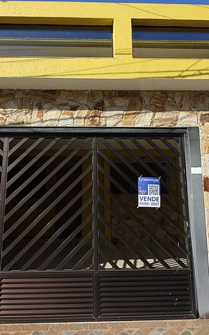Casa à venda com 146m², 3 quartos e 2 vagasFachada e placa