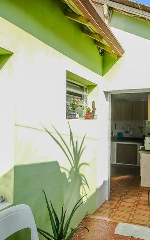 Casa à venda com 102m², 3 quartos e 2 vagasQuintal