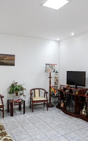 Casa à venda com 102m², 3 quartos e 2 vagasSala