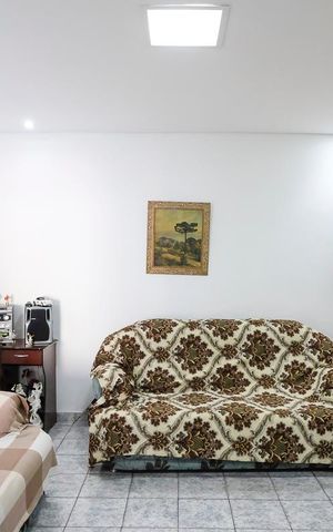 Casa à venda com 102m², 3 quartos e 2 vagasSala