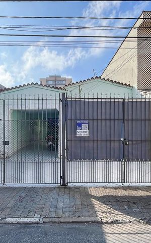 Casa à venda com 102m², 3 quartos e 2 vagasFachada + plaquinha