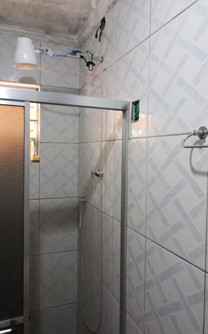 Casa à venda com 294m², 4 quartos e 4 vagasBanheiro 2