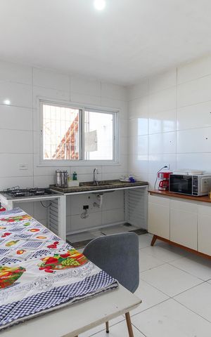 Casa à venda com 125m², 2 quartos e 2 vagasCozinha