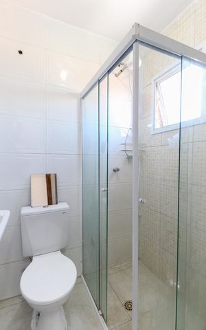 Casa à venda com 125m², 2 quartos e 2 vagasBanheiro da Suíte 2