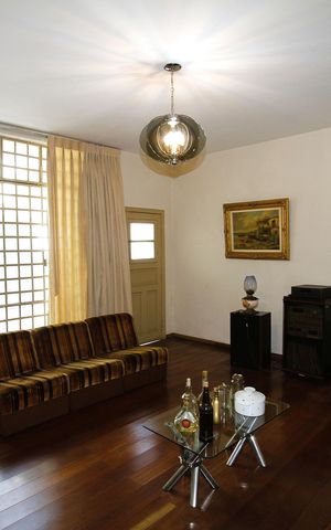 Casa à venda com 229m², 5 quartos e 4 vagasSala de Estar