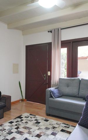 Casa de condomínio à venda com 90m², 2 quartos e 2 vagasSala