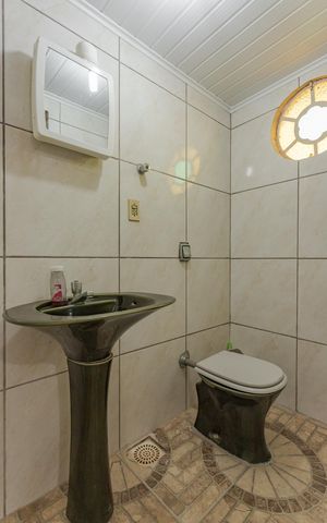 Casa à venda com 200m², 4 quartos e 2 vagas Casa à venda com 200m², 4 quartos e 2 vagasBanheiro da Suíte