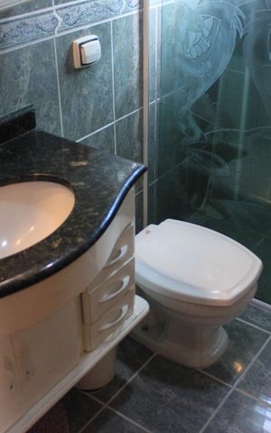 Casa à venda com 213m², 3 quartos e 4 vagasBanheiro