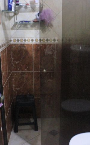 Casa à venda com 315m², 4 quartos e 6 vagasBanheiro da Suíte 1
