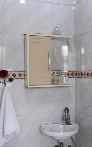 Casa à venda com 315m², 4 quartos e 6 vagasBanheiro da edícula