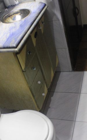 Casa à venda com 315m², 4 quartos e 6 vagasBanheiro da Suíte 2