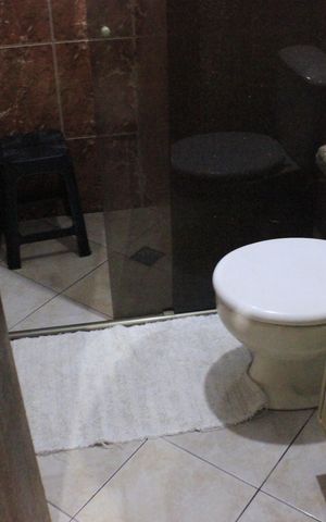Casa à venda com 315m², 4 quartos e 6 vagasBanheiro da Suíte 1
