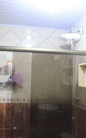 Casa à venda com 315m², 4 quartos e 6 vagasBanheiro da Suíte 1