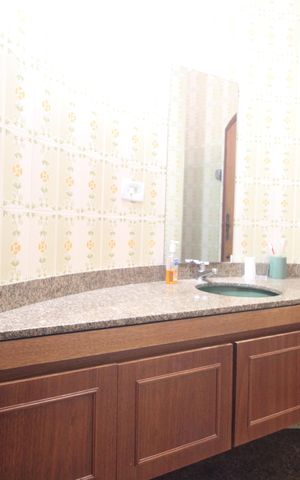 Casa à venda com 400m², 4 quartos e 3 vagasBanheiro da Suíte 2 e 3