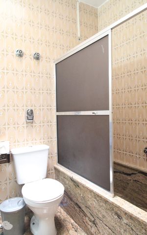 Casa à venda com 400m², 4 quartos e 3 vagasBanheiro da Suíte 1