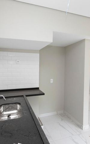 Casa de condomínio à venda com 80m², 2 quartos e 2 vagasCOZINHA