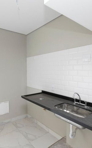 Casa de condomínio à venda com 80m², 2 quartos e 2 vagasCOZINHA