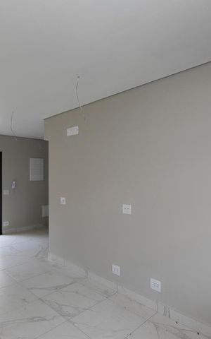 Casa de condomínio à venda com 80m², 2 quartos e 2 vagasSALA DOIS AMBIENTES