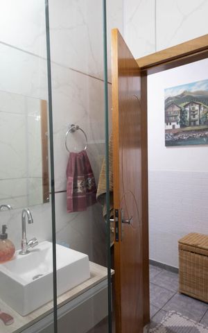 Casa à venda com 74m², 3 quartos e 1 vaga Casa à venda com 74m², 3 quartos e 1 vagaBanheiro