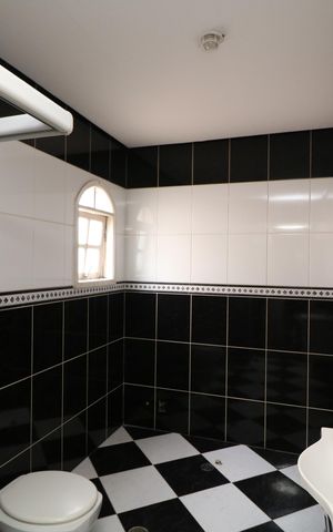 Casa à venda com 450m², 8 quartos e 2 vagasBanheiro da Suíte 2