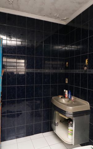 Casa à venda com 450m², 8 quartos e 2 vagasBanheiro da Suíte 5