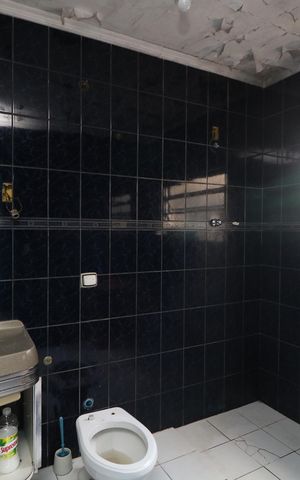 Casa à venda com 450m², 8 quartos e 2 vagasBanheiro da Suíte 5
